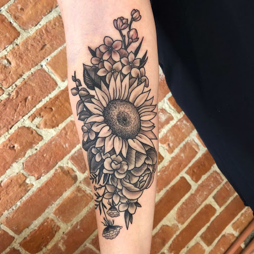 Explore cowboy up tattoo ideas, creative tattoo ideas in Buffalo, available at The Tilted Rose Tattoo