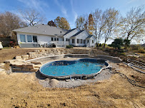 Quad City Lawn and Landscape - Photo 2 - Car repair in , Davenport