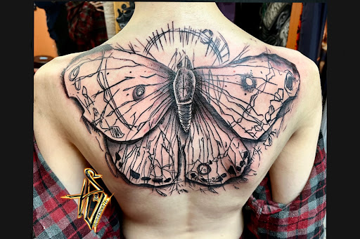 Explore bone tattoo ideas, creative tattoo ideas in Menomonee Falls, available at Color Bomb Tattoo Shop and Body Piercing