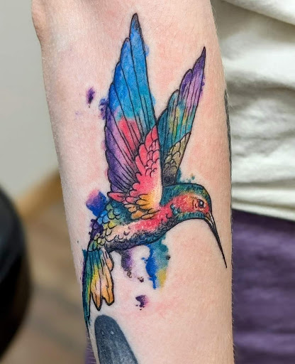 Find tattoo armband ideas for your next unique tattoo in Cornelia at Prismatic Pulse Tattoo