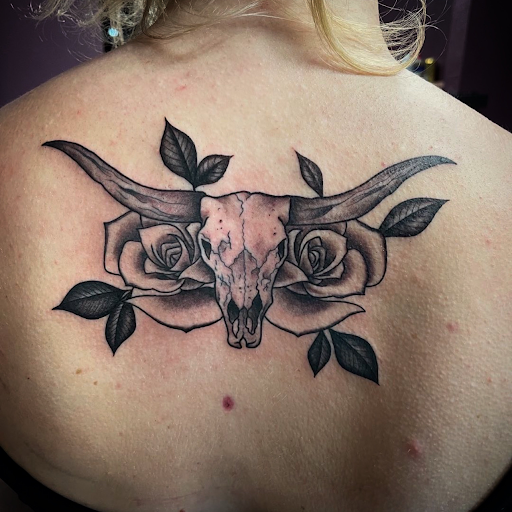 Explore calf tattoo ideas for women, creative tattoo ideas in Georgetown, available at Iron Rite Tattoo South