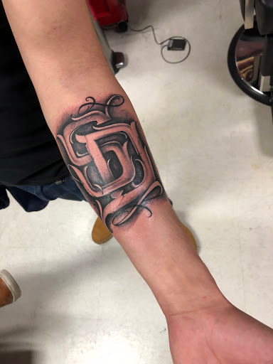 Explore cover up tattoo ideas female leg, creative tattoo ideas in San Diego, available at Wylde Sydes Tattoo & Body Piercing