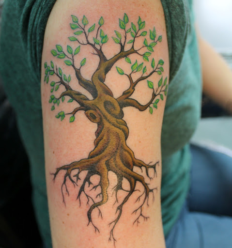 Find background tattoo ideas for guys for your next unique tattoo in Fort Myers at Tiger Lotus Tattoo and Piercing