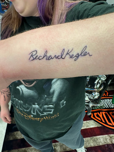 Explore ribbon tattoo ideas, creative tattoo ideas in Orland, available at K1LL3R ARTW0RK