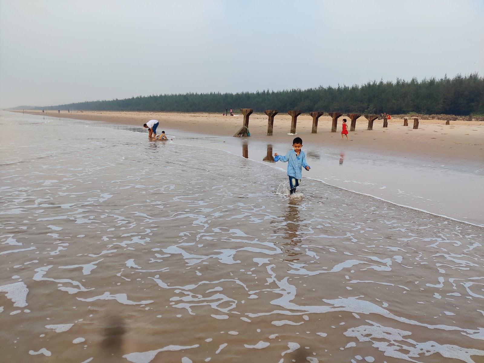 Φωτογραφία του Ramapuram Shootout Beach με επίπεδο καθαριότητας εν μέρει καθαρό