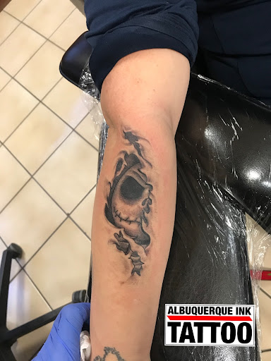 Explore cerberus tattoo ideas, creative tattoo ideas in Albuquerque, available at Albuquerque Ink tattoo College Plaza