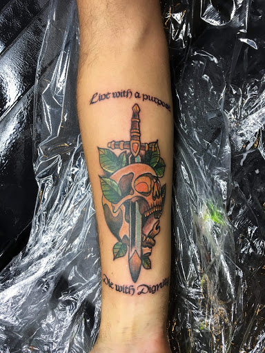 Explore cover up tattoo ideas on chest, creative tattoo ideas in Warrensburg, available at Altered Visions Tattoo Studio