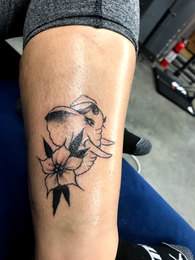 Find inbetween boob tattoo ideas for your next unique tattoo in Corona at Crop Circles Tattoo Studio