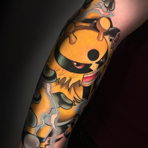 Explore wrap around tattoo ideas, creative tattoo ideas in Kissimmee, available at Fallen Sparrow Tattoo Co