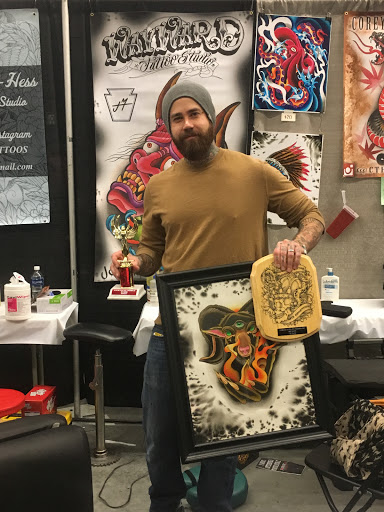 Explore back neck tattoo ideas, creative tattoo ideas in Erie, available at Wayward Tattoo Studio