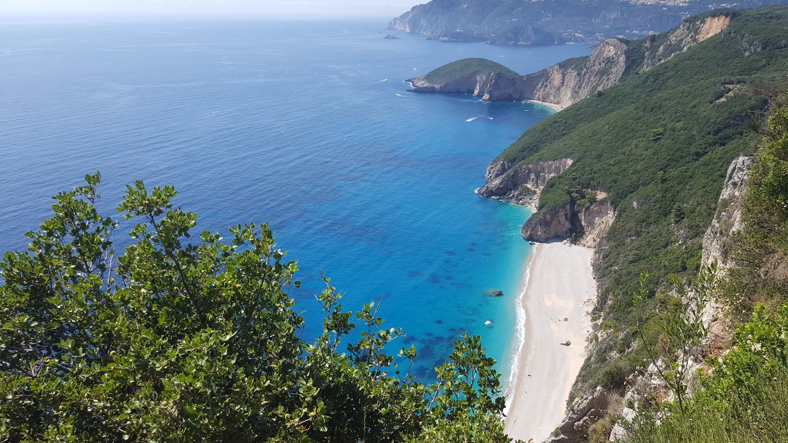 Foto di Stelari beach con una superficie del sabbia beige e ciottoli