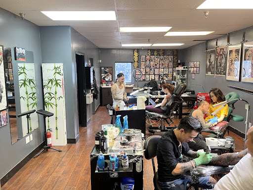 Explore rose thigh tattoo ideas, creative tattoo ideas in Seattle, available at Dragon Tattoo