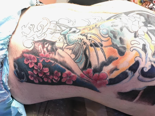 Explore female chest tattoo ideas, creative tattoo ideas in Casper, available at Ink Spot