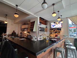 Brewing tanks in a taproom