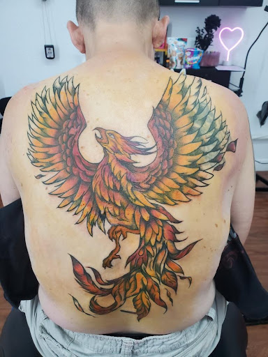 Explore sleeve tattoo ideas for females, creative tattoo ideas in Cocoa, available at Rorschach Tattoo Shop and Piercing Studio