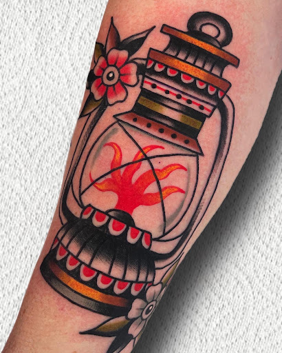 Explore lion tattoo ideas for guys, creative tattoo ideas in Johnson City, available at Gold Cross Tattoo Co.