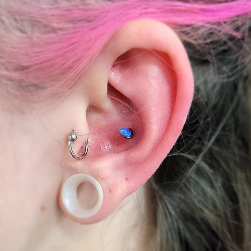 Find small sun tattoo ideas for your next unique tattoo in Sarasota at Z-Edge Tattoo and Body Piercing North Shop