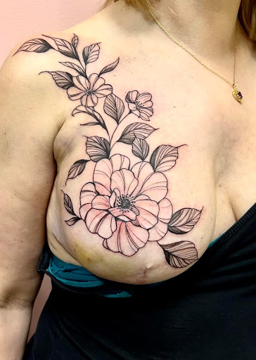 Explore fish tattoo ideas for men, creative tattoo ideas in Batavia, available at The Pretty Pin-Up Tattoo Parlor