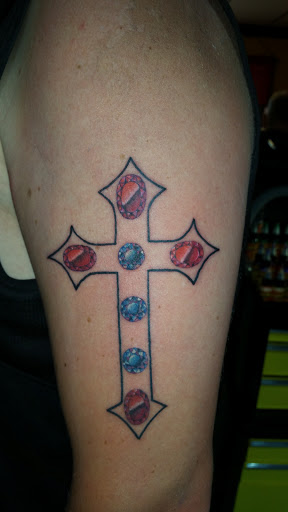 Explore strength tattoo ideas for females, creative tattoo ideas in Foley, available at Black Sheep Custom Tattoos and Piercings