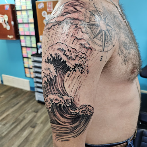 Explore japanese half sleeve tattoo ideas, creative tattoo ideas in Traverse City, available at Pinups & Needles