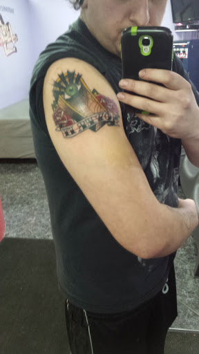 Find dragon tattoo idea for your next unique tattoo in Taylor at Babydolls Tattoos