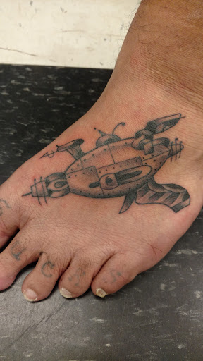 Explore men's rib tattoo ideas, creative tattoo ideas in Edgewood, available at Banthalope Studios