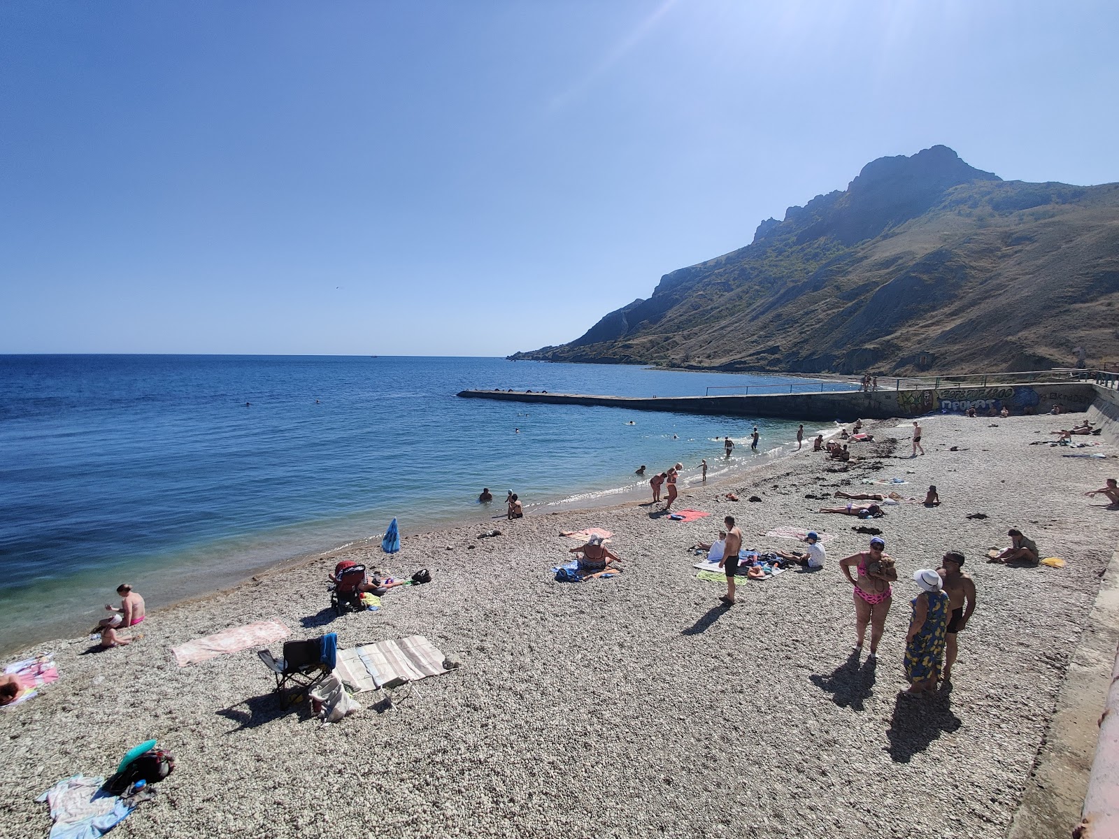 Fotografija Impul's Plazh z svetel pesek površino
