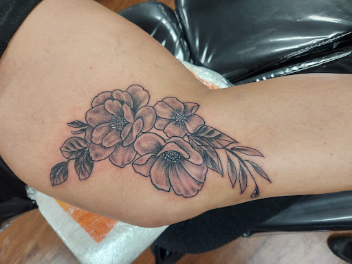 Explore heart locket tattoo ideas, creative tattoo ideas in Rogers, available at Saved by Grace Tattoo Studio