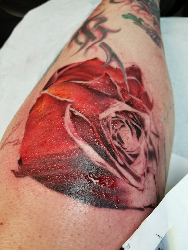 Explore three cross tattoo ideas, creative tattoo ideas in Auburn, available at Action Tattoo