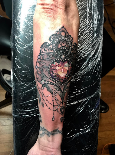 Explore half sleeve tribal tattoo ideas, creative tattoo ideas in Silver City, available at Independent Ink Tattoo