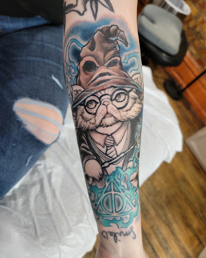 Tattoo Shop «Eclectic Art Tattoo Gallery», reviews and photos, 615 E Michigan Ave, Lansing, MI 48912, USA