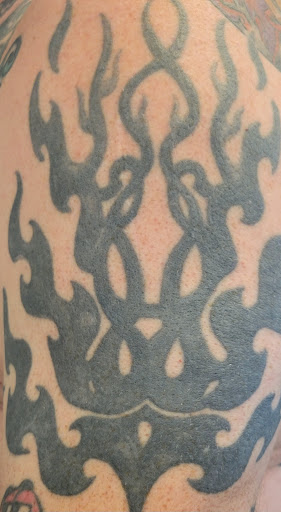 Explore hawaii tattoo ideas for men, creative tattoo ideas in Niles, available at TakeTatt Tattoo Removal