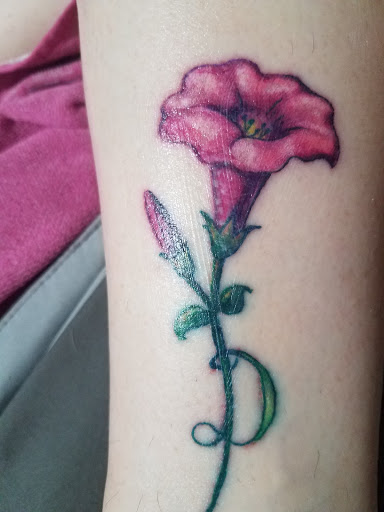 Explore middle arm tattoo ideas, creative tattoo ideas in Seattle, available at Fenix Tattoo and Piercing