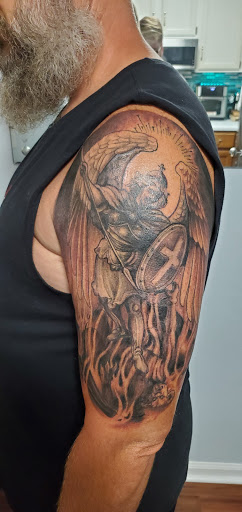 Explore cover up tattoo ideas for names, creative tattoo ideas in Wilmington, available at Jade Monkey Tattoo