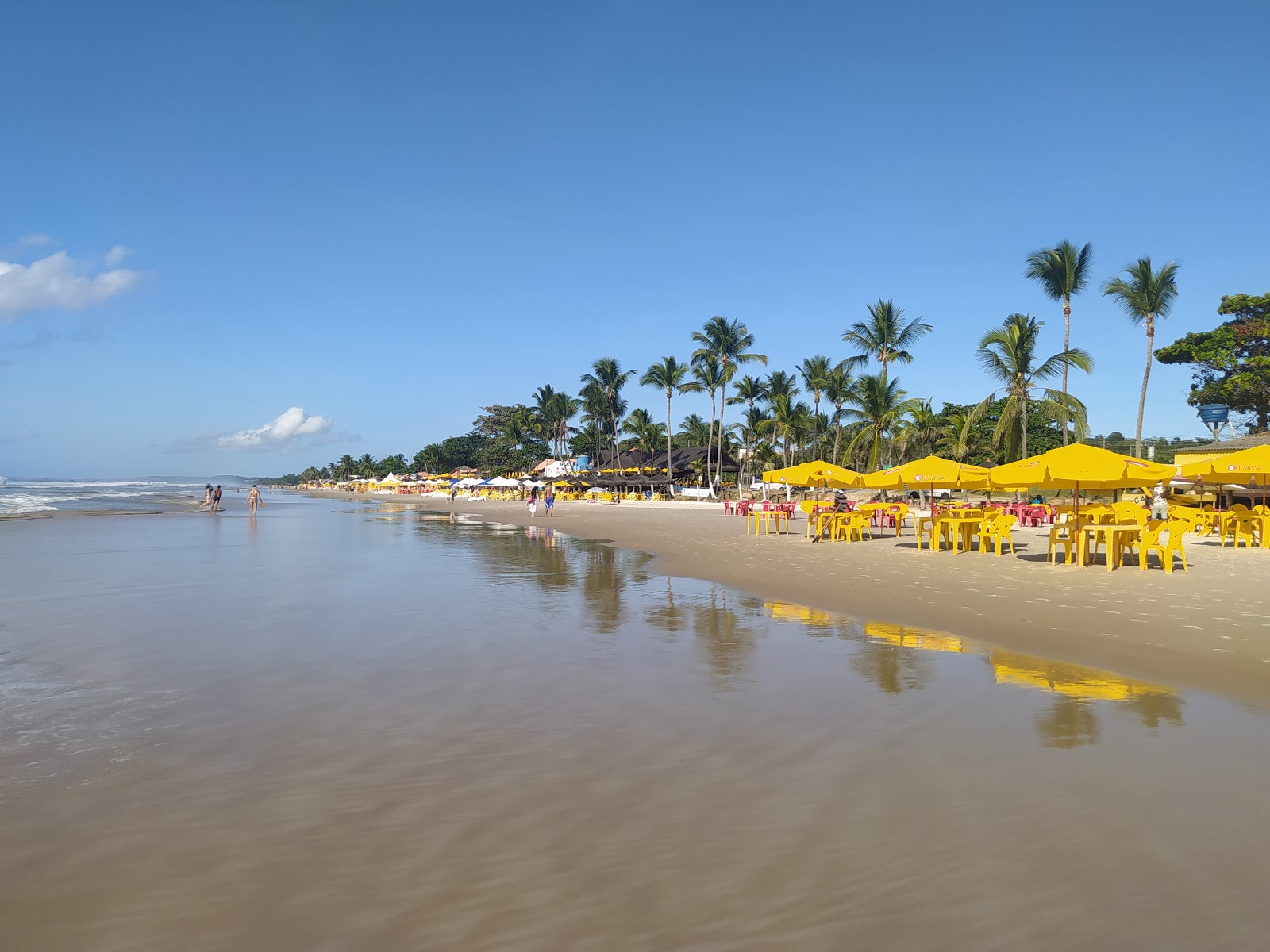 Fotografija Praia Dos Milionarios z svetel fin pesek površino