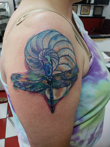 Explore ankle tattoo ideas for women, creative tattoo ideas in Vinton, available at Cherry Bomb Tattoo and piercing