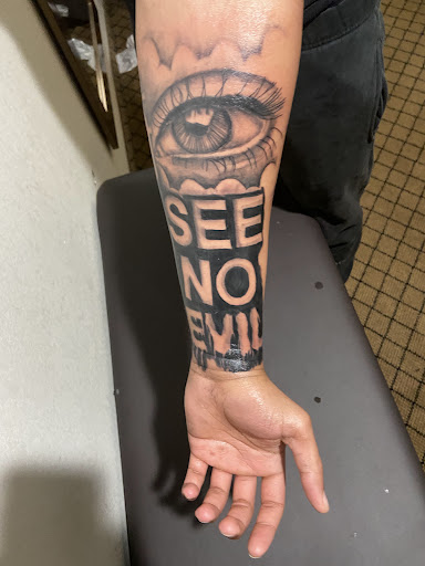 Explore skull sleeve tattoo ideas, creative tattoo ideas in Charlotte, available at BNI-Tattoos