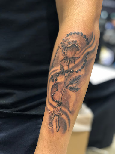 Explore blue flame tattoo ideas, creative tattoo ideas in Dalton, available at Rail Side Tattoo Co. (no piercings)