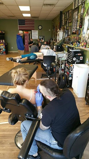 Tattoo Shop «Tattoo Machine Gun- Clark», reviews and photos, 1705 Charlestown New Albany Rd a, Jeffersonville, IN 47130, USA