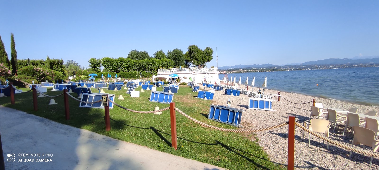 Fotografija Spiaggia Cala de Or z prostorna obala