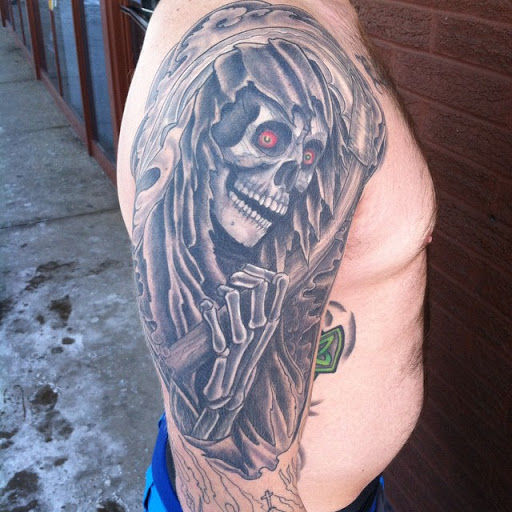 Find mom of 4 tattoo ideas for your next unique tattoo in Boulder at Claw and Talon Tattoo