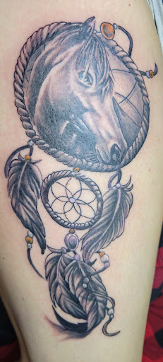 Explore 100 dollar bill tattoo ideas, creative tattoo ideas in Angola, available at Hoodlum Ink