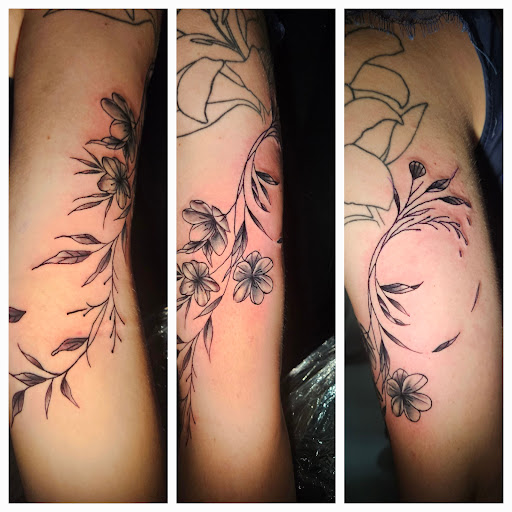 Explore women leg tattoo ideas, creative tattoo ideas in Angola, available at Hoodlum Ink