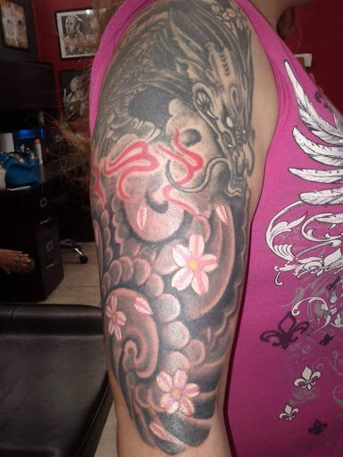 Explore skeleton hand tattoo ideas, creative tattoo ideas in San Angelo, available at A1 Tattoos and Piercings