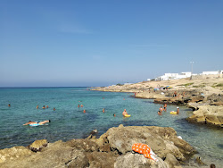 Photo de Spiaggia di Marina di Mancaversa avec plusieurs petites baies