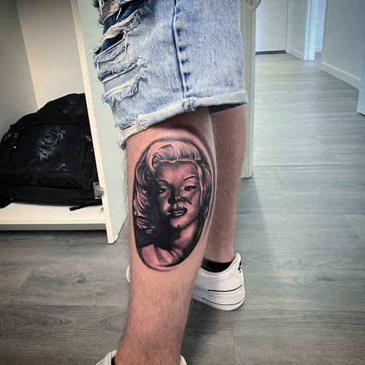 Explore boo tattoo ideas, creative tattoo ideas in Belleville, available at Dark Horse Tattoo Company, LLC