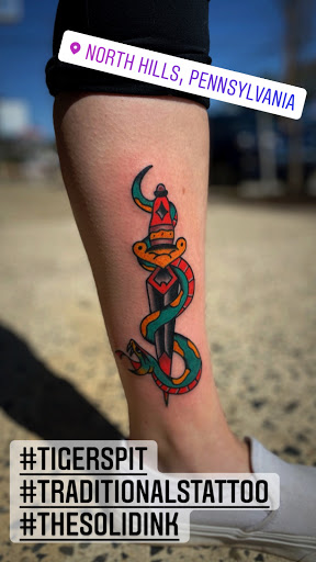 Find dragon tattoo ideas for men for your next unique tattoo in Glenside at Yellow Rose Tattoo