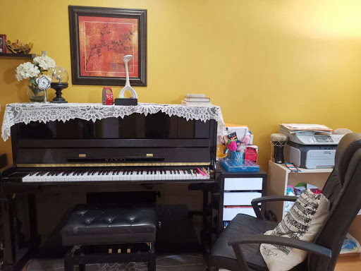 Mae's Piano Studio