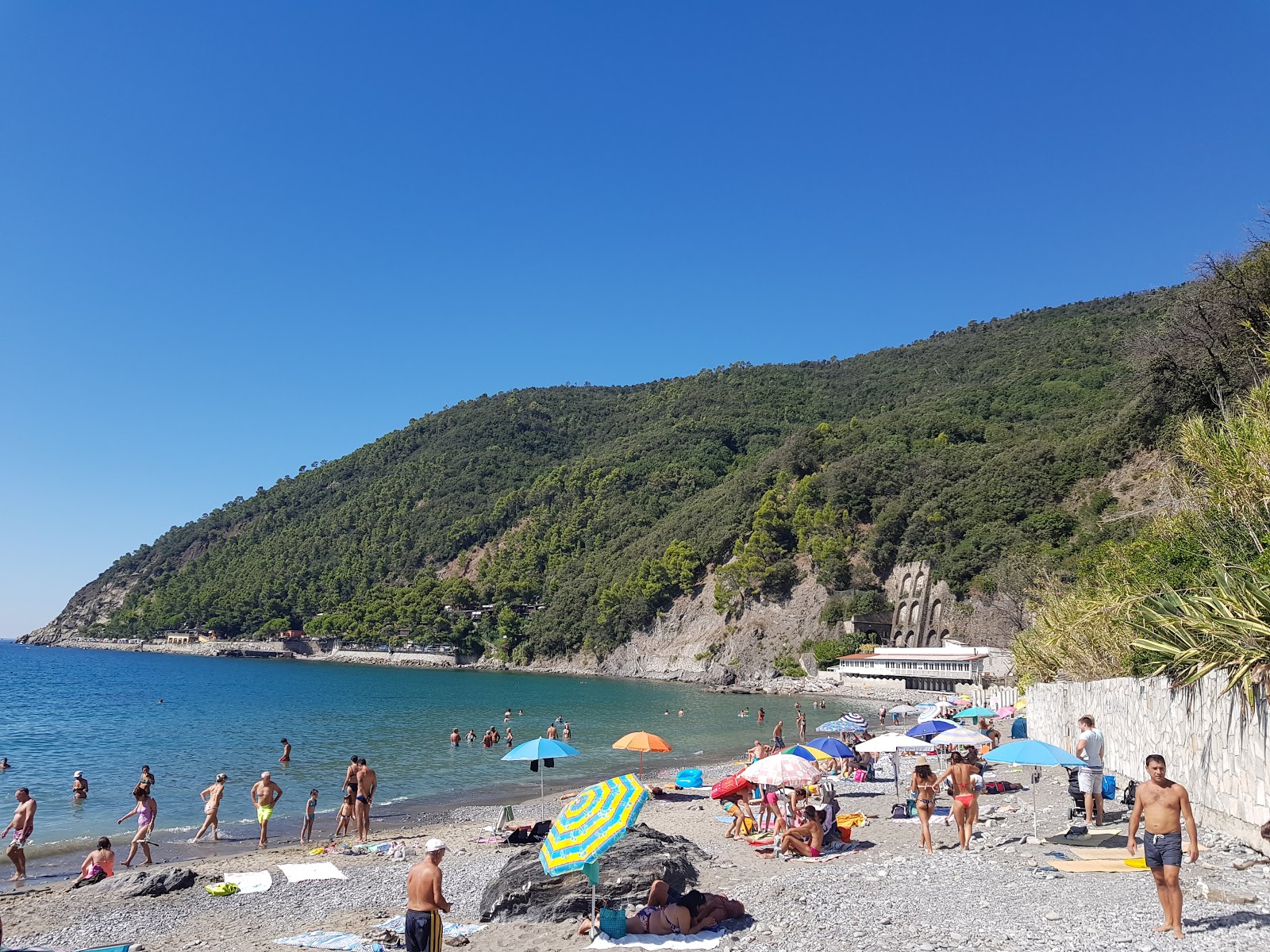 Fotografie cu Spiaggia La Secca cu o suprafață de apa albastra