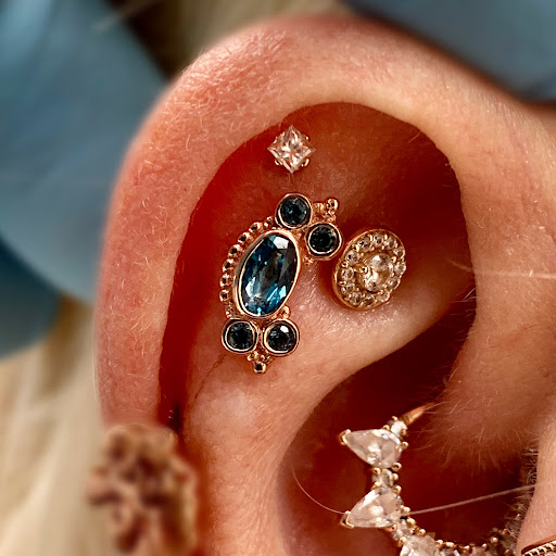 Explore roman numeral tattoo ideas for guys, creative tattoo ideas in Salem, available at Thistle Piercing & Fine Jewelry